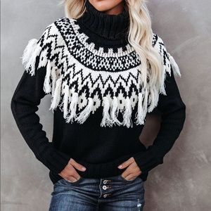 Turtle neck sweater with tassels/fringe